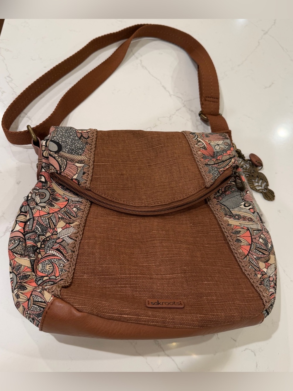 Sakroots Brown Crossbody with Coral and Cream Patterned Panels